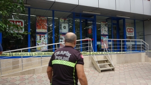 Marketi basıp kasiyer kadını öldürdü 