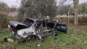 Hurdaya dönen otomobilden yaralı kurtuldu 