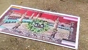 Kabe fotoğrafının yere atılmasına tepki