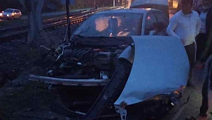 Trenin biçtiği araçta burnu bile kanamadı 