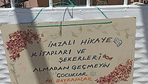 Bayram ziyaretine imzalı kitap hediyesi 