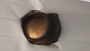 Patlayan tüpün parçası konteyneri deldi geçti