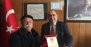 Arapgir'de muhtarlara plaket verildi
