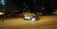 Takla atan otomobilden hafif yaralı kurtuldu
