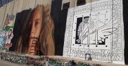 Filistinli sanatçılar, Ayrım Duvarı'na "cesur kız" Tamimi'nin resmini çizdi