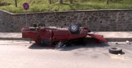 Takla atan araçtan yara almadan kurtuldu