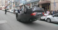 Takla atan otomobilden burnu bile kanamadan kurtuldu